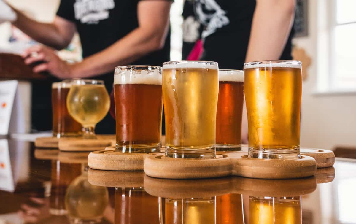 5 types of zero alcohol beers on a tray